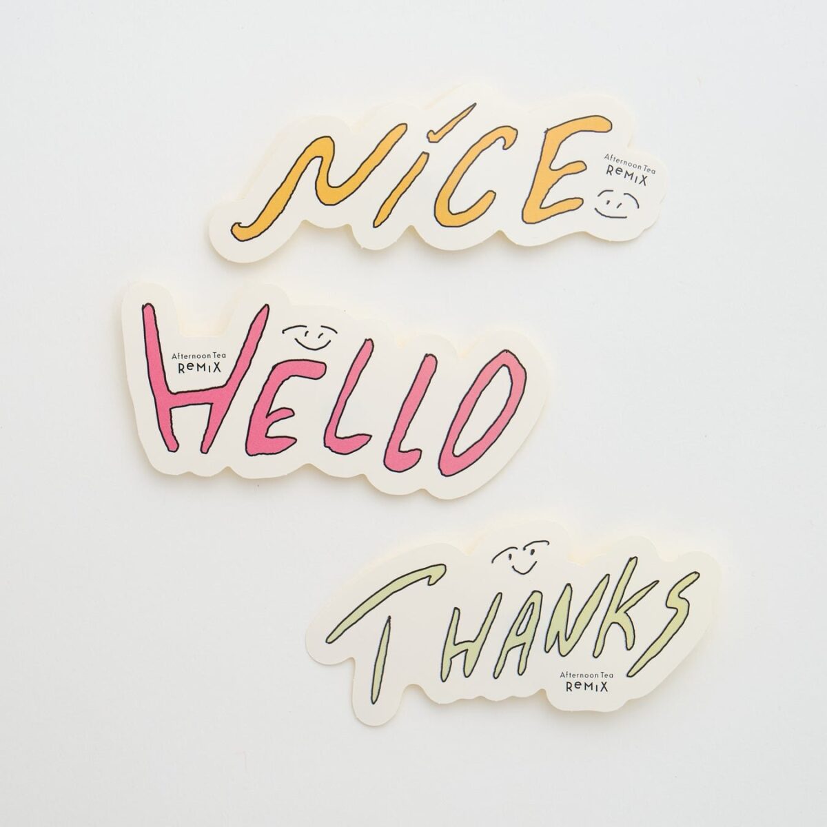 田中シェンさん描き下ろしのNICE・HELLO・THANKSステッカー